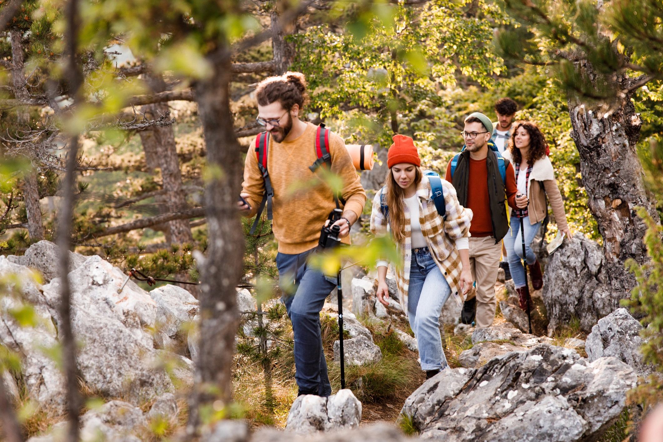 Family hiking together through the woods