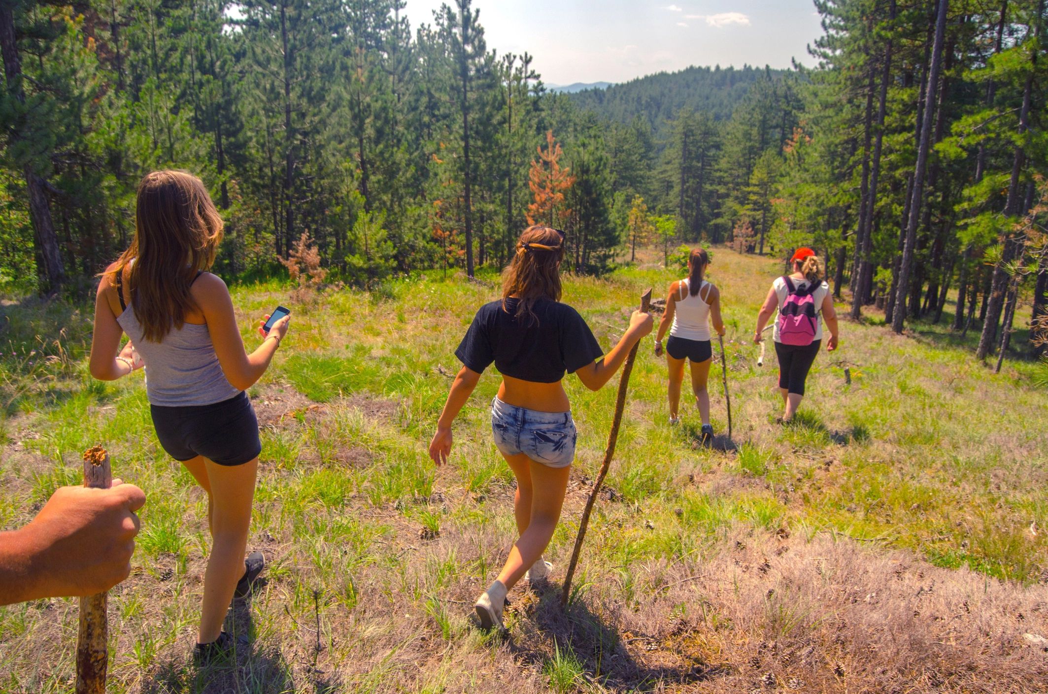 Family hiking together in the mountains